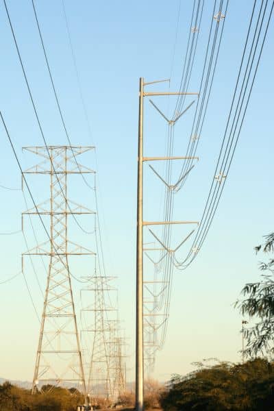 Utility power lines over residential land showing easement area that requires a property survey